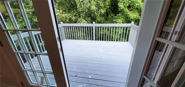 an empty room with furniture and a fireplace