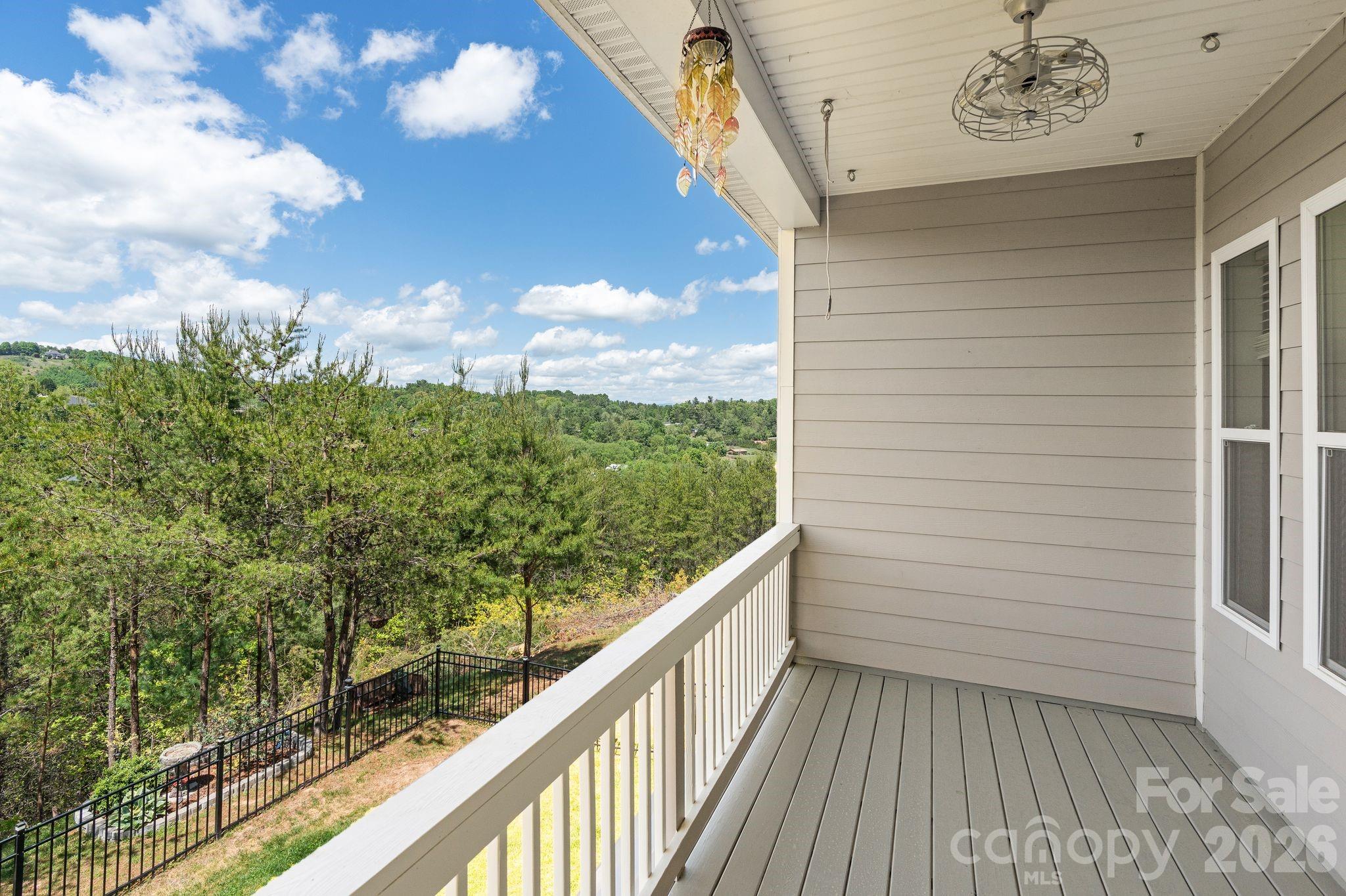 34 Rose Creek Road Leicester, NC 28748 - Photo 12 of 37 a view of a balcony with wooden floor
