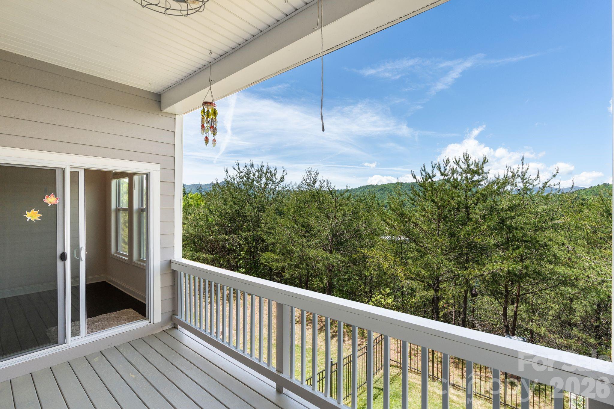 34 Rose Creek Road Leicester, NC 28748 - Photo 13 of 37 a balcony with an outdoor space