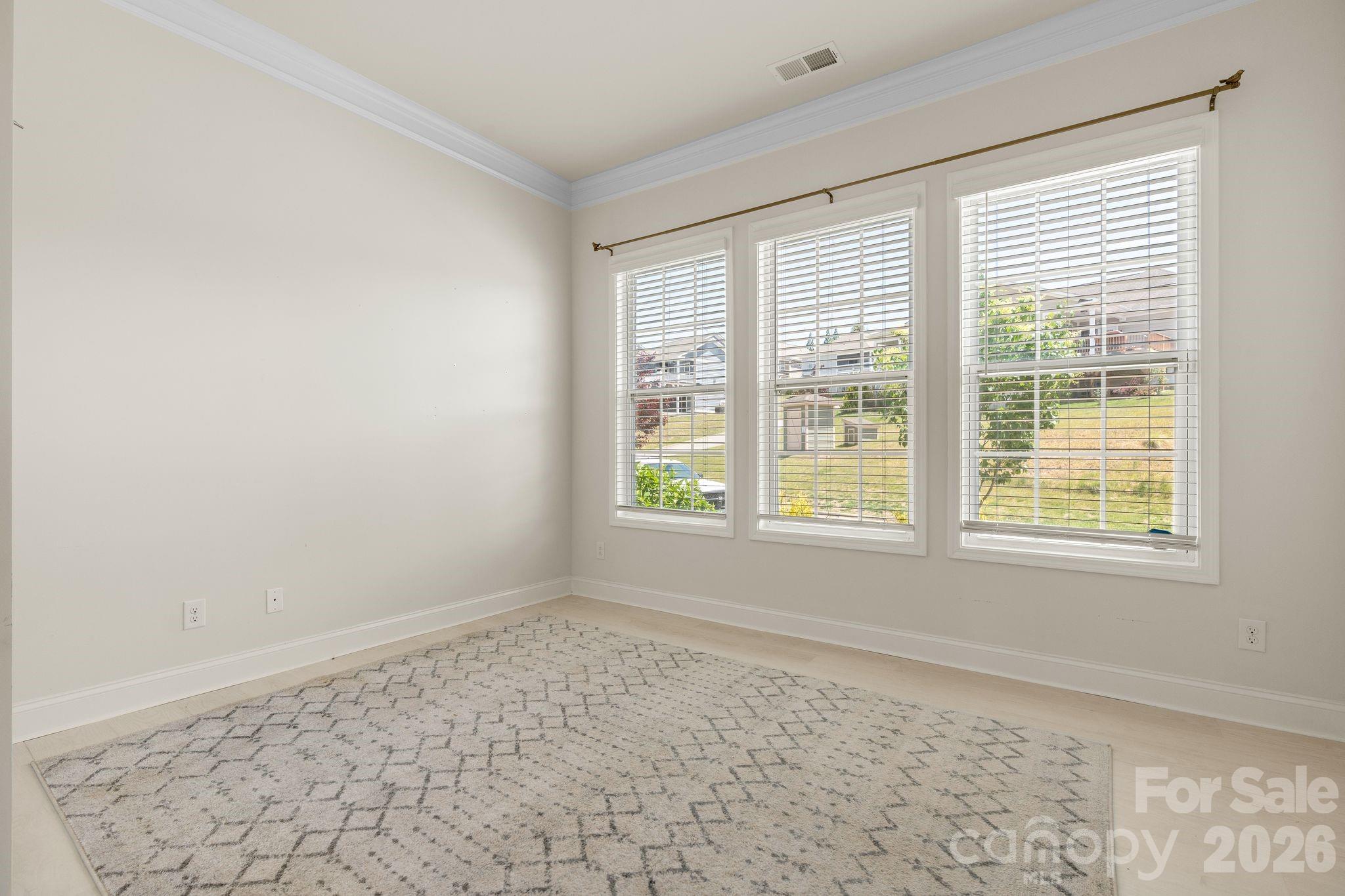 34 Rose Creek Road Leicester, NC 28748 - Photo 14 of 37 an empty room with a window