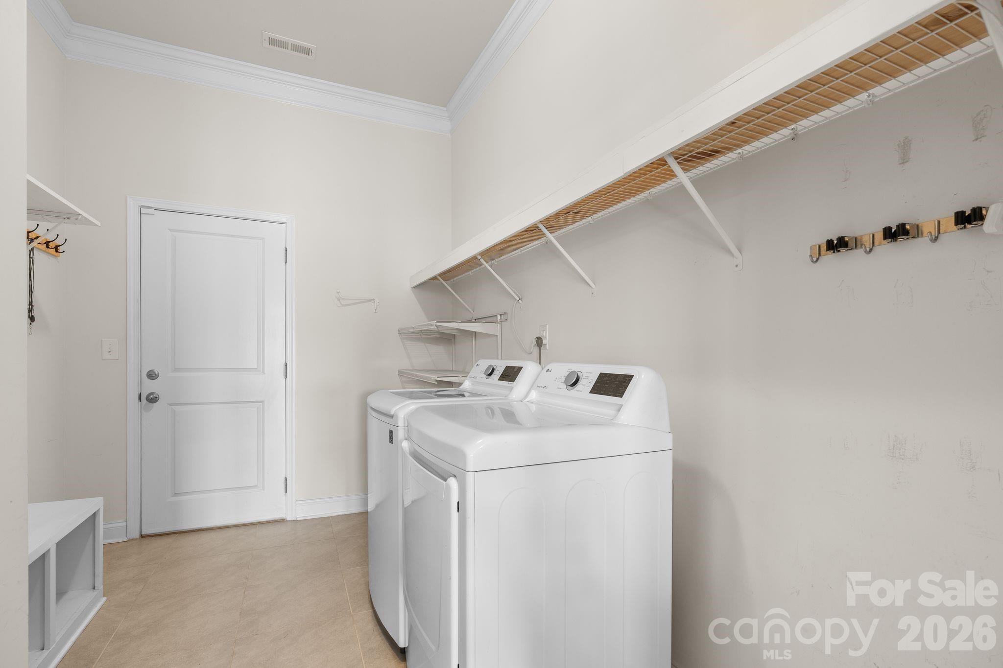 34 Rose Creek Road Leicester, NC 28748 - Photo 18 of 37 a utility room with dryer and washer
