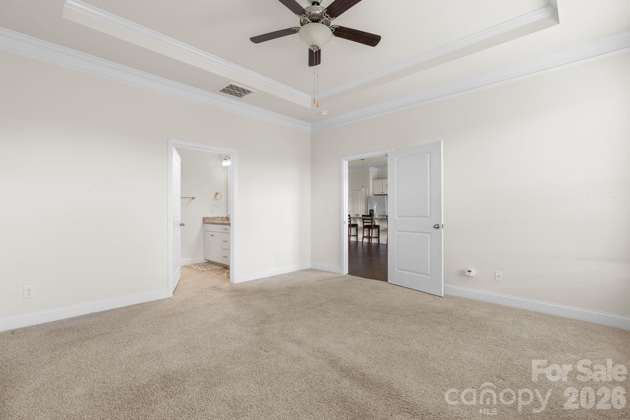 34 Rose Creek Road Leicester, NC 28748 - Photo 21 of 37 a view of an empty room with a ceiling fan