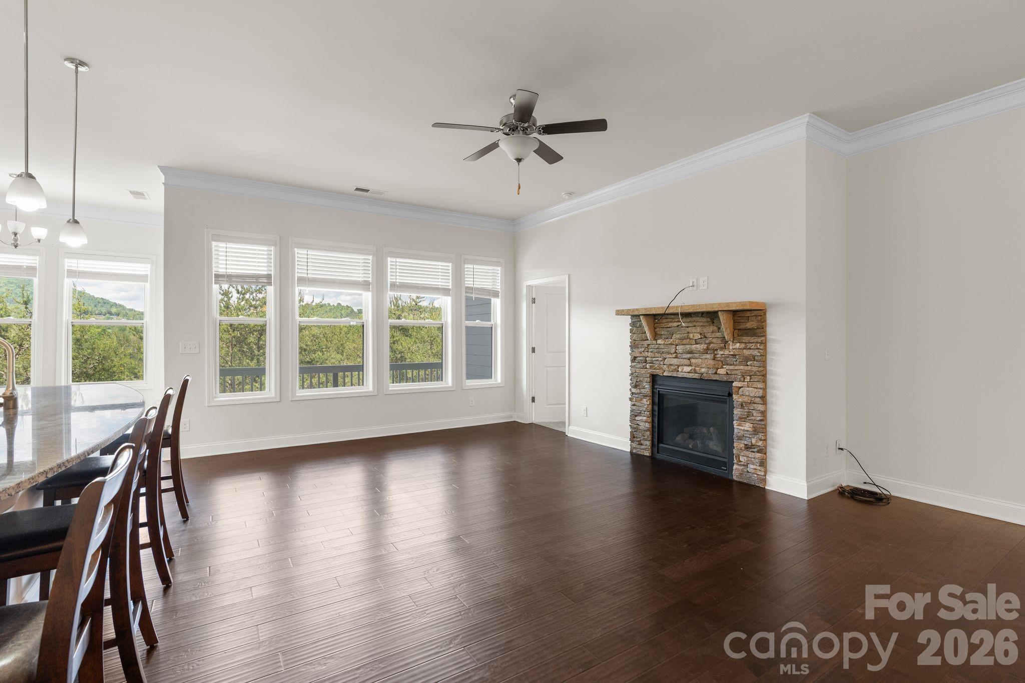 34 Rose Creek Road Leicester, NC 28748 - Photo 5 of 37 a view of livingroom with furniture window and wooden floor