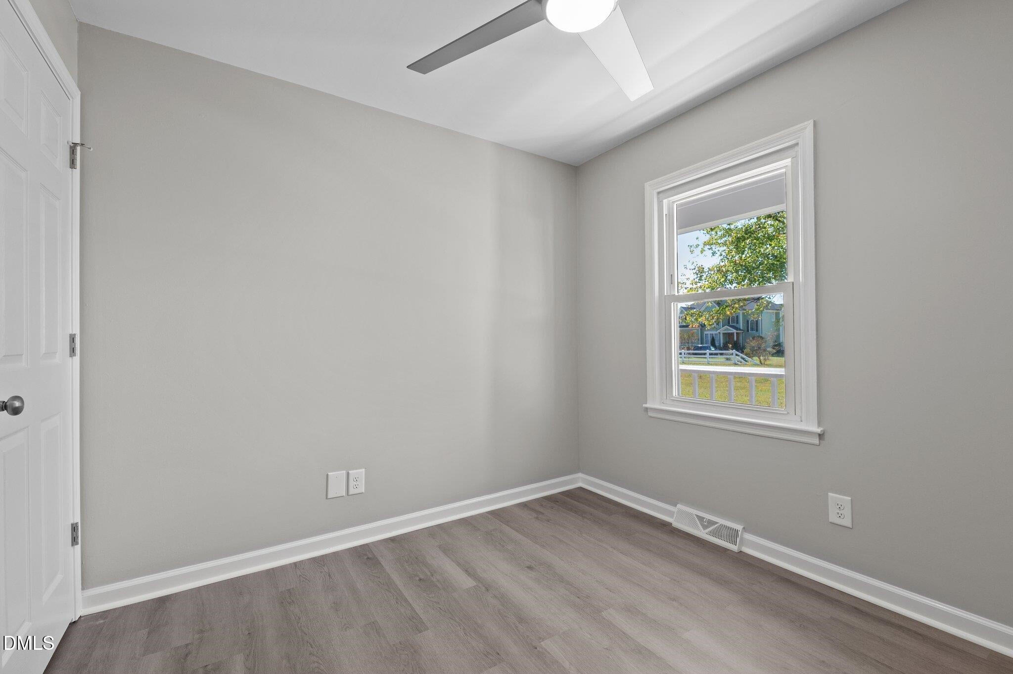 6501 Rock Service Station Road Raleigh, NC 27603 - Photo 44 of 49 an empty room with a window