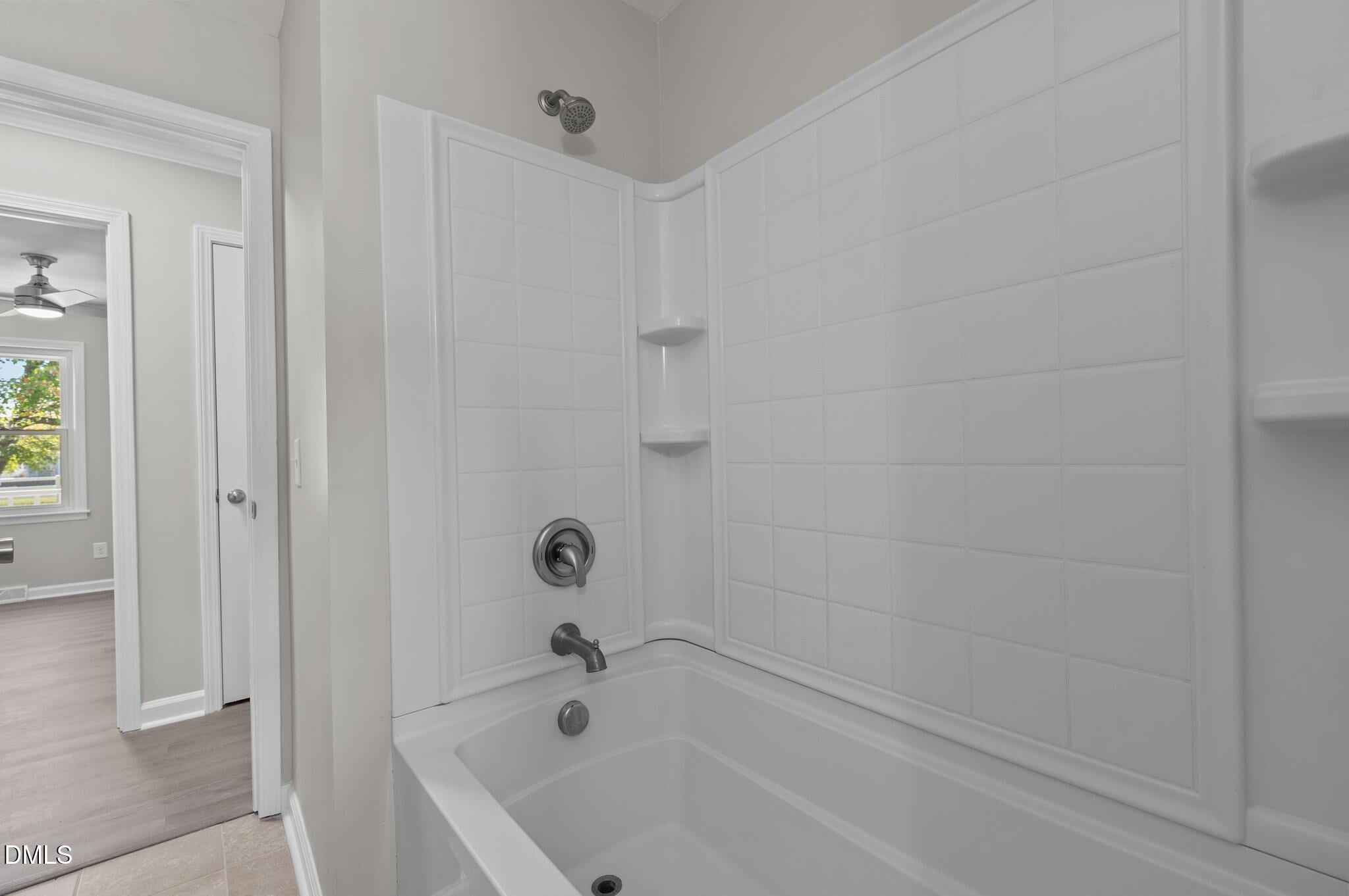 6501 Rock Service Station Road Raleigh, NC 27603 - Photo 47 of 49 a bathroom with a bathtub