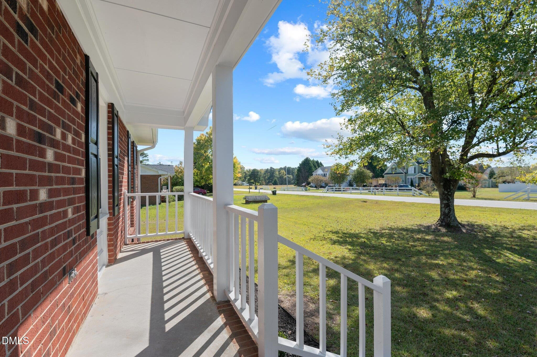 6501 Rock Service Station Road Raleigh, NC 27603 - Photo 4 of 49 a view of a balcony with lake view