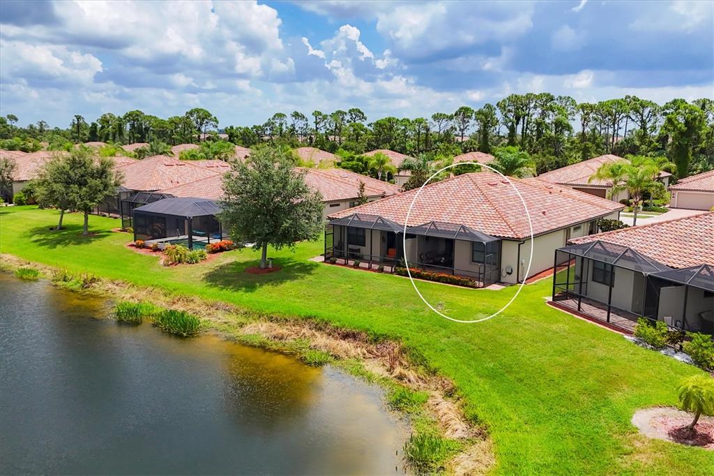 20041 Benissimo Drive Venice, FL 34293 - Photo 36 of 67 a view of a house with pool and a yard