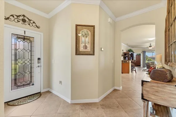 a view of a hallway with front door