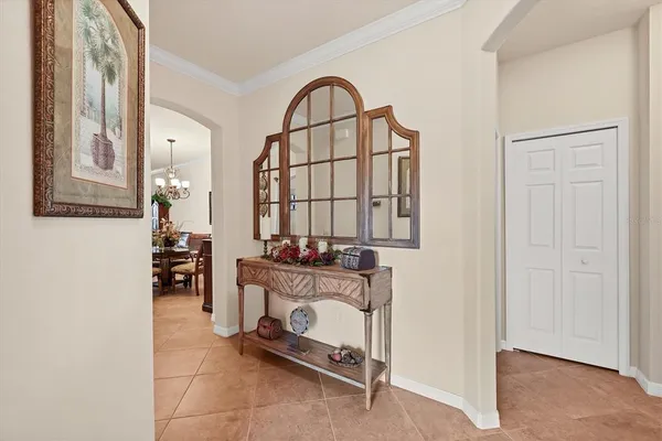 a view of living room filled with furniture and window