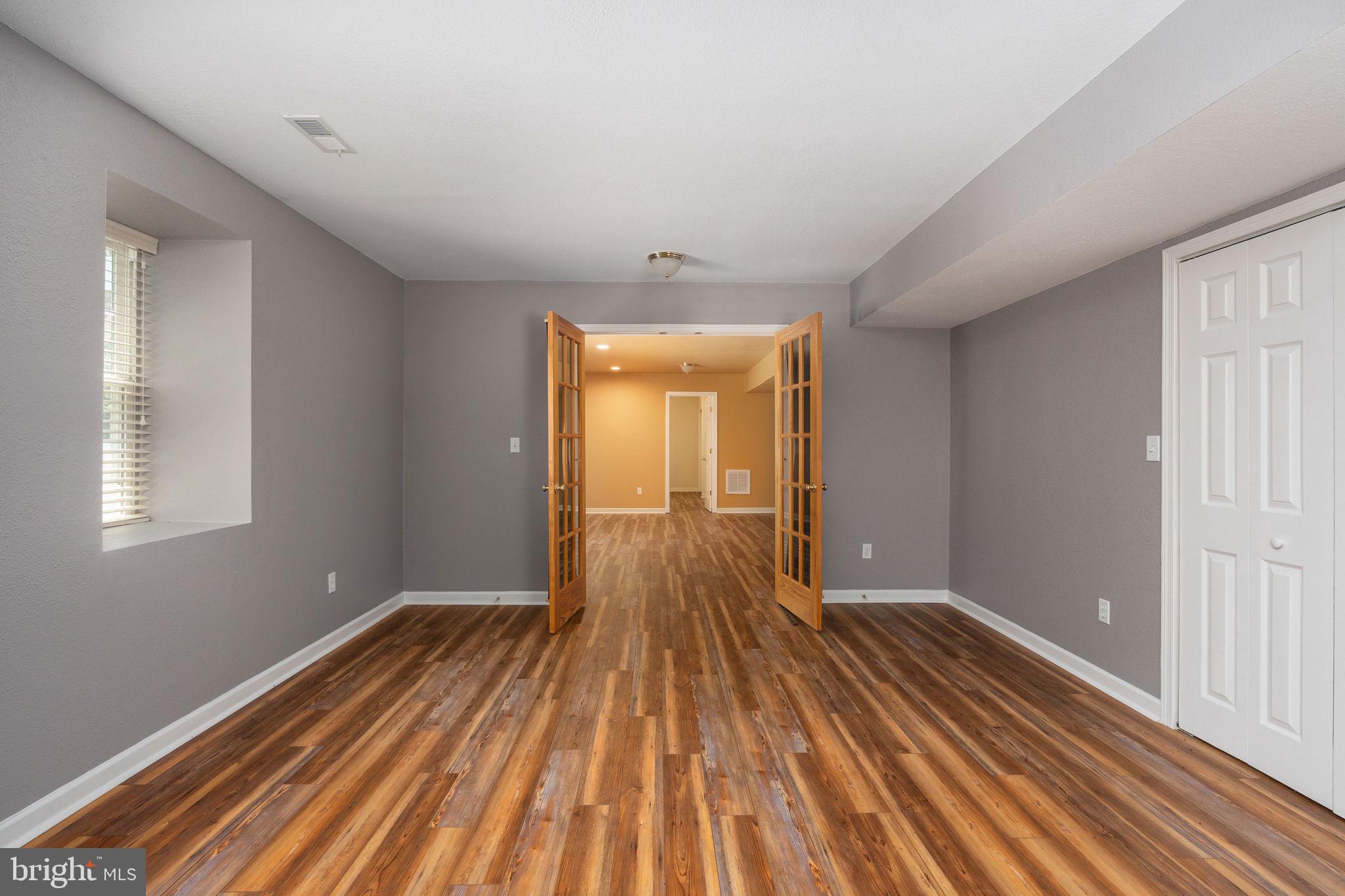 8009 Burrell Road Fredericksburg, VA 22407 - Photo 39 of 66 Spacious room with elegant entryway.
