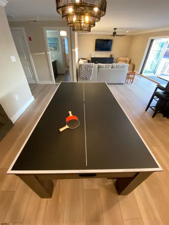 a bedroom with a bed and lamp