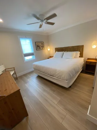 a bathroom with a shower and a sink