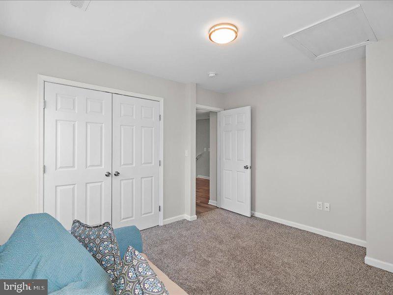 712 South Blue Ridge Avenue Culpeper, VA 22701 - Photo 27 of 47 a view of a livingroom with wooden floor and bathroom