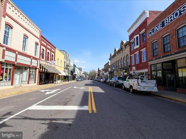 a view of a street with cars