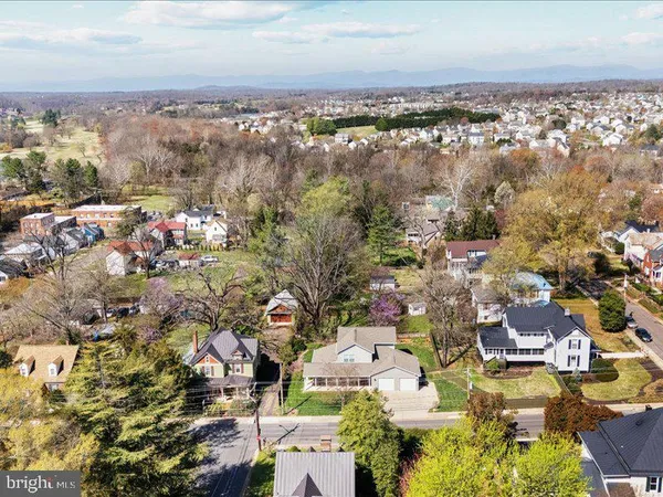 an aerial view of a city with lots of residential buildings