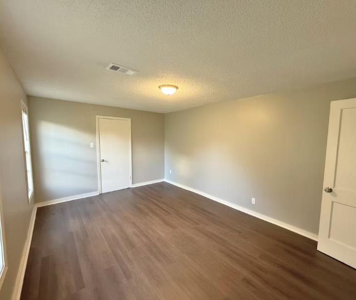 433 Dixie Road Memphis, TN 38109 - Photo 8 of 11 wooden floor in an empty room