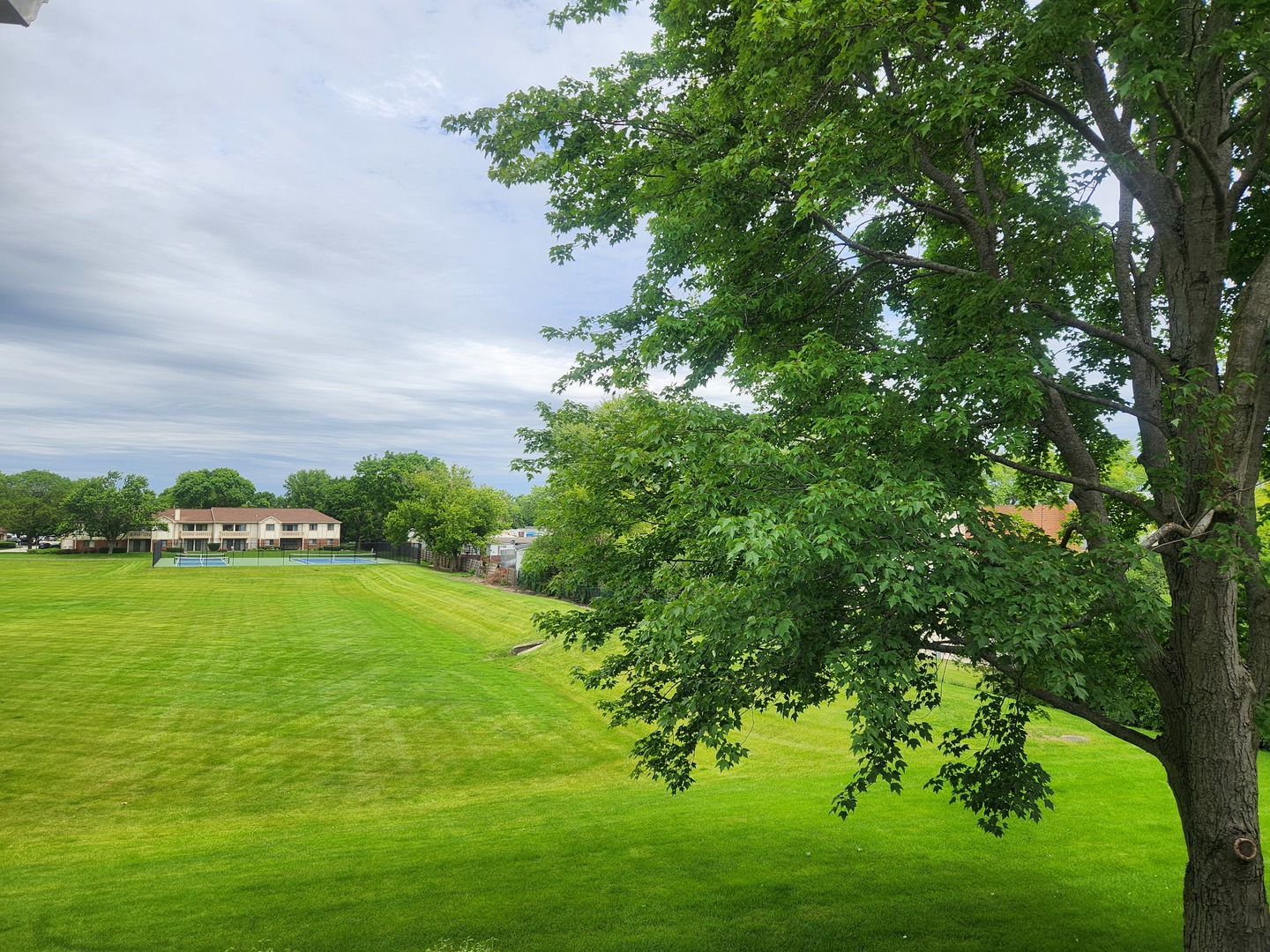 1020 Boxwood Court, Unit C2 Wheeling, IL 60090 - Photo 15 of 21 a view of a golf course with a lake