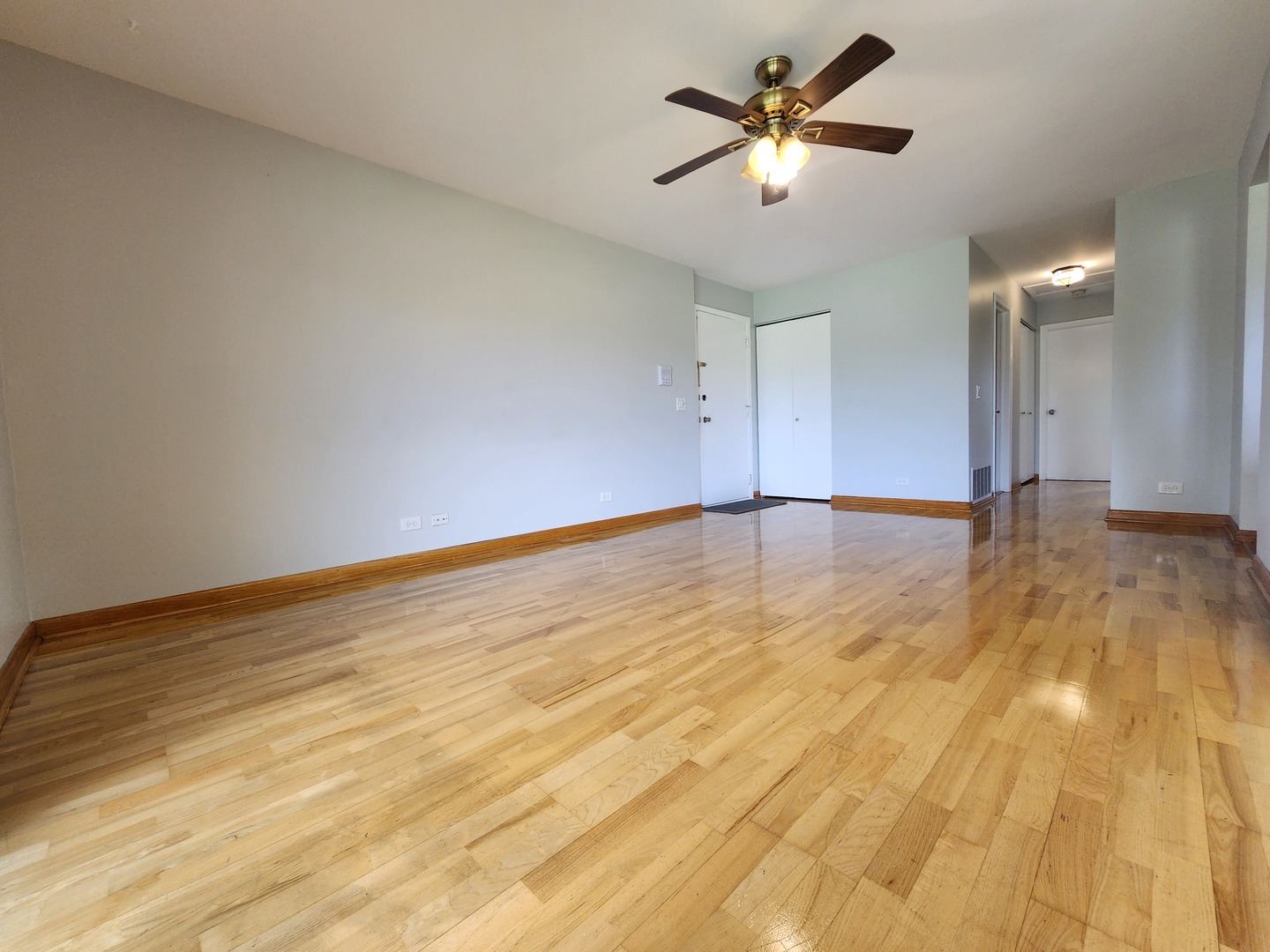 1020 Boxwood Court, Unit C2 Wheeling, IL 60090 - Photo 20 of 21 a view of a room with a wooden floor
