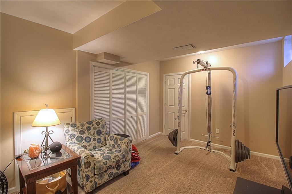 103 Chestnut Ridge Drive Beaver Falls, PA 15010 - Photo 16 of 25 Finished basement game room with plenty of storage