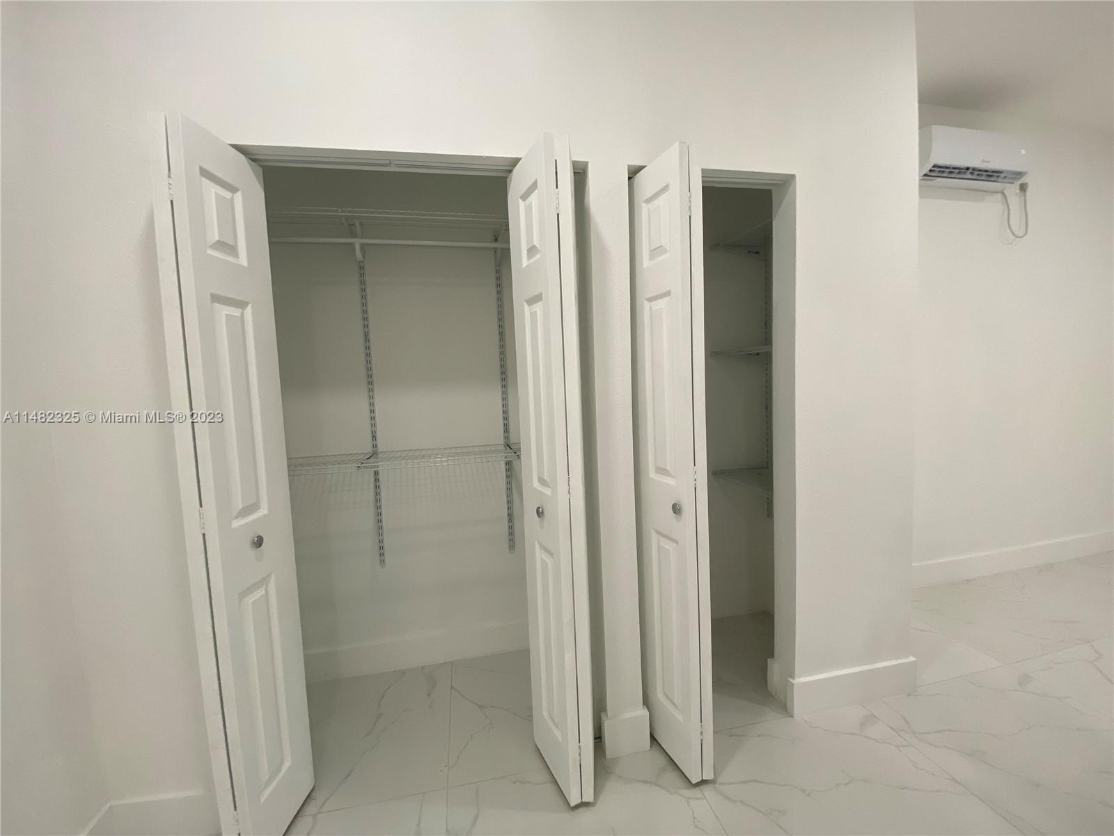 12829 Southwest 228th Street, Unit 2 Miami, FL 33170 - Photo 11 of 23 a bathroom with a shower and a glass door