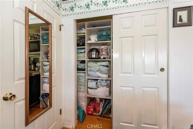 a room that has a door and a closet