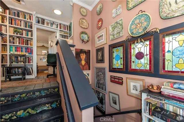 a view of a room with lots of stuff and hardwood floor