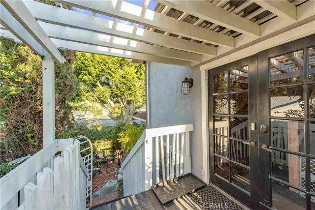 a view of balcony with wooden floor