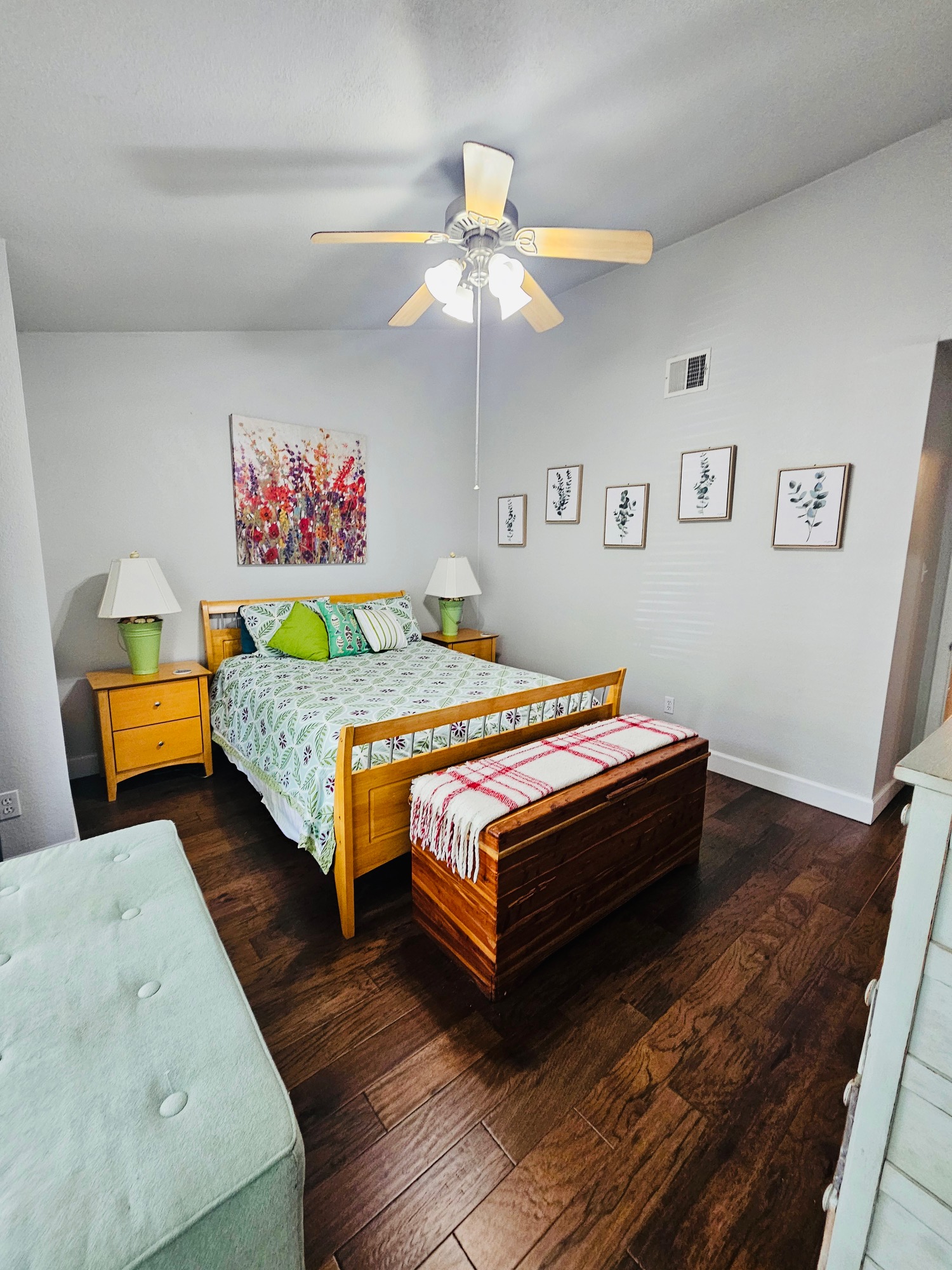 5107 Leralynn Street, Unit 304 Austin, TX 78751 - Photo 8 of 28 Bedroom with a ceiling fan, hardwood / wood-style flooring, baseboards,