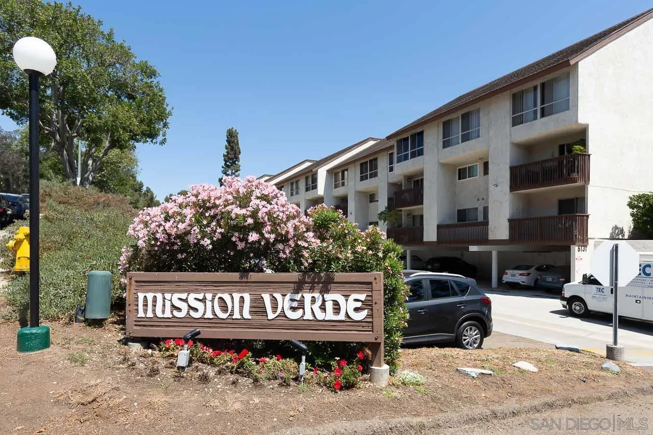 6171 Rancho Mission Road, Unit 208 San Diego, CA 92108 - Photo 17 of 18 a street sign on a pole on a street
