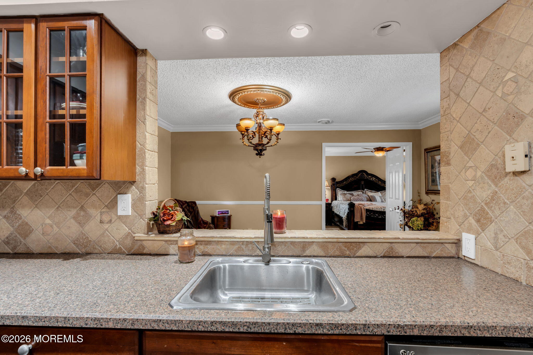 1 Breakwater Square Freehold, NJ 07728 - Photo 18 of 33 a kitchen with a sink and a mirror