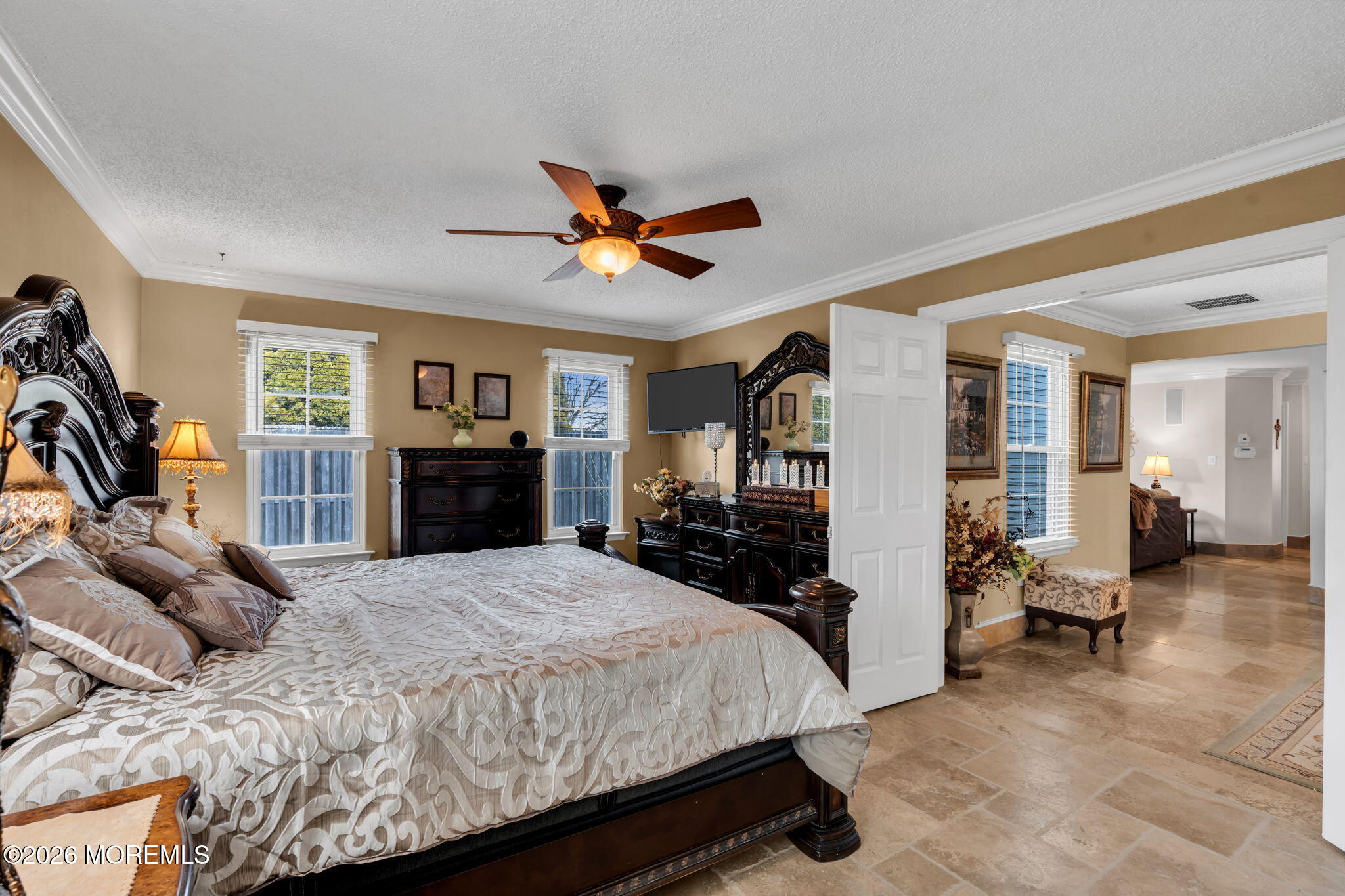 1 Breakwater Square Freehold, NJ 07728 - Photo 23 of 33 a bedroom with a bed gym equipment and a large window