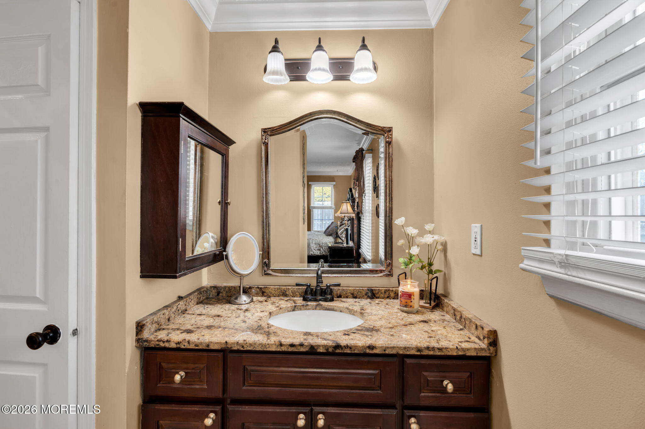 1 Breakwater Square Freehold, NJ 07728 - Photo 24 of 33 a bathroom with a granite countertop sink and a mirror