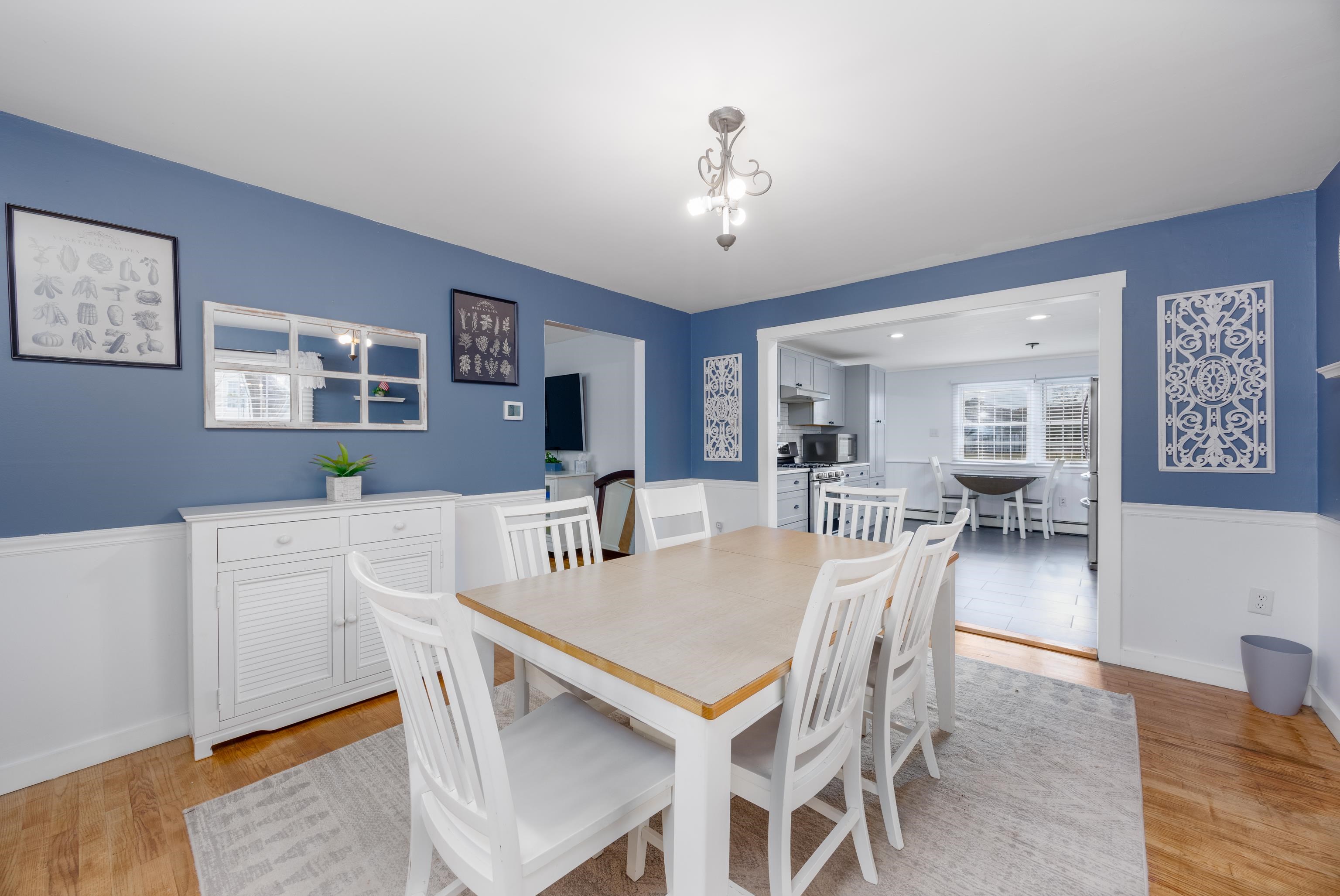 103 Bate Avenue Rio Grande, NJ 08242 - Photo 11 of 50 a view of a dining room with furniture and wooden floor
