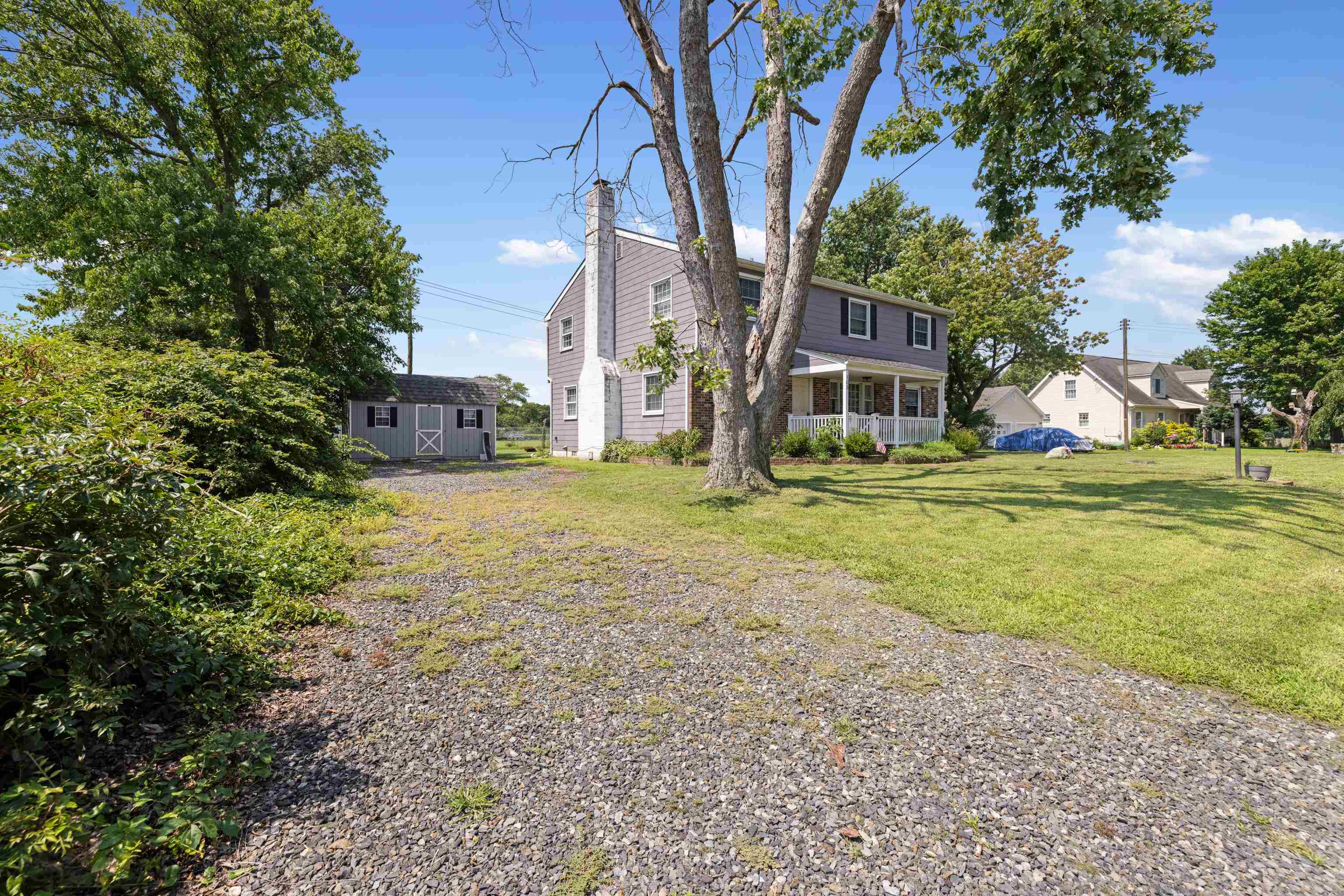 103 Bate Avenue Rio Grande, NJ 08242 - Photo 35 of 50 a view of a house with a yard