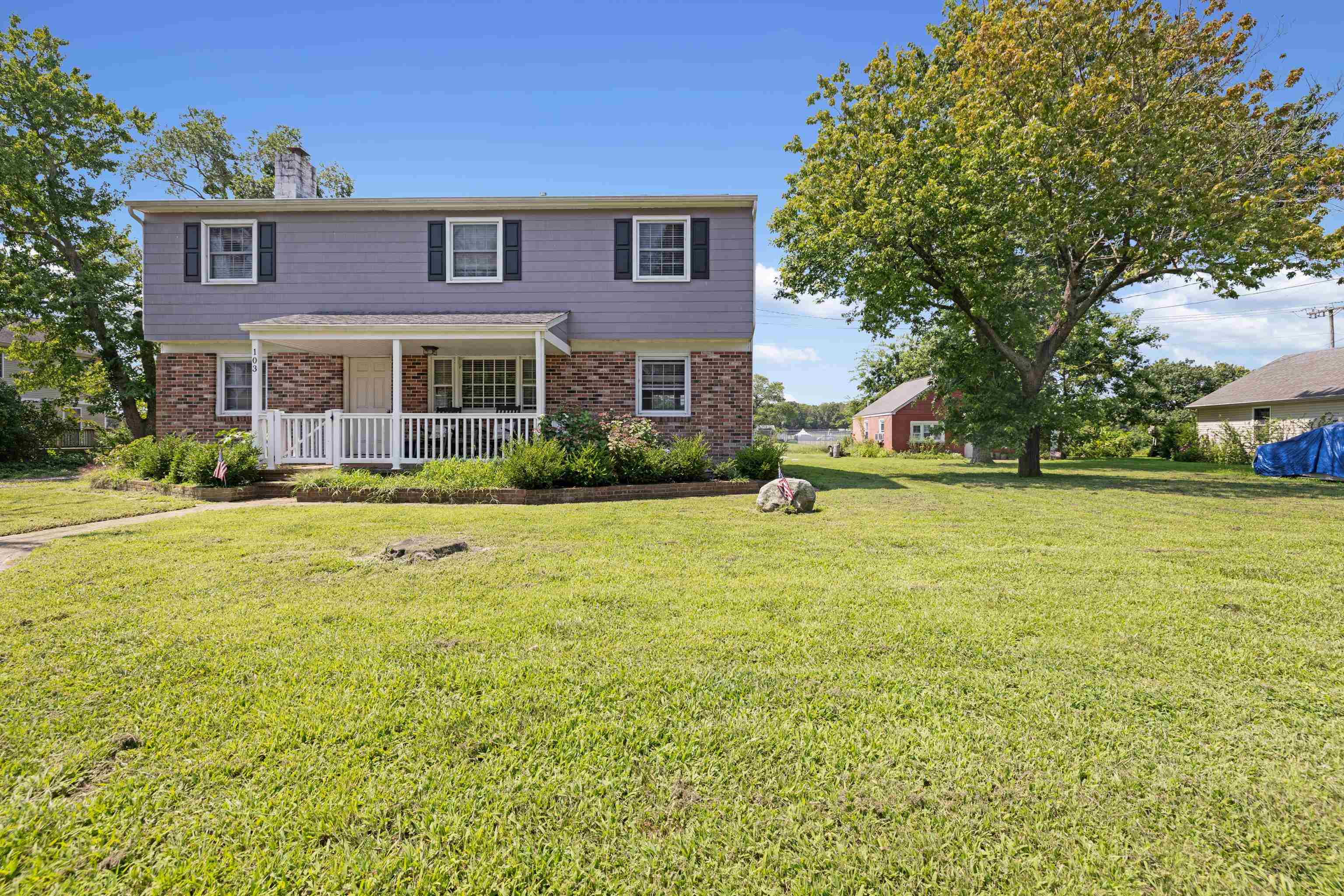 103 Bate Avenue Rio Grande, NJ 08242 - Photo 37 of 50 a front view of house with yard and green space