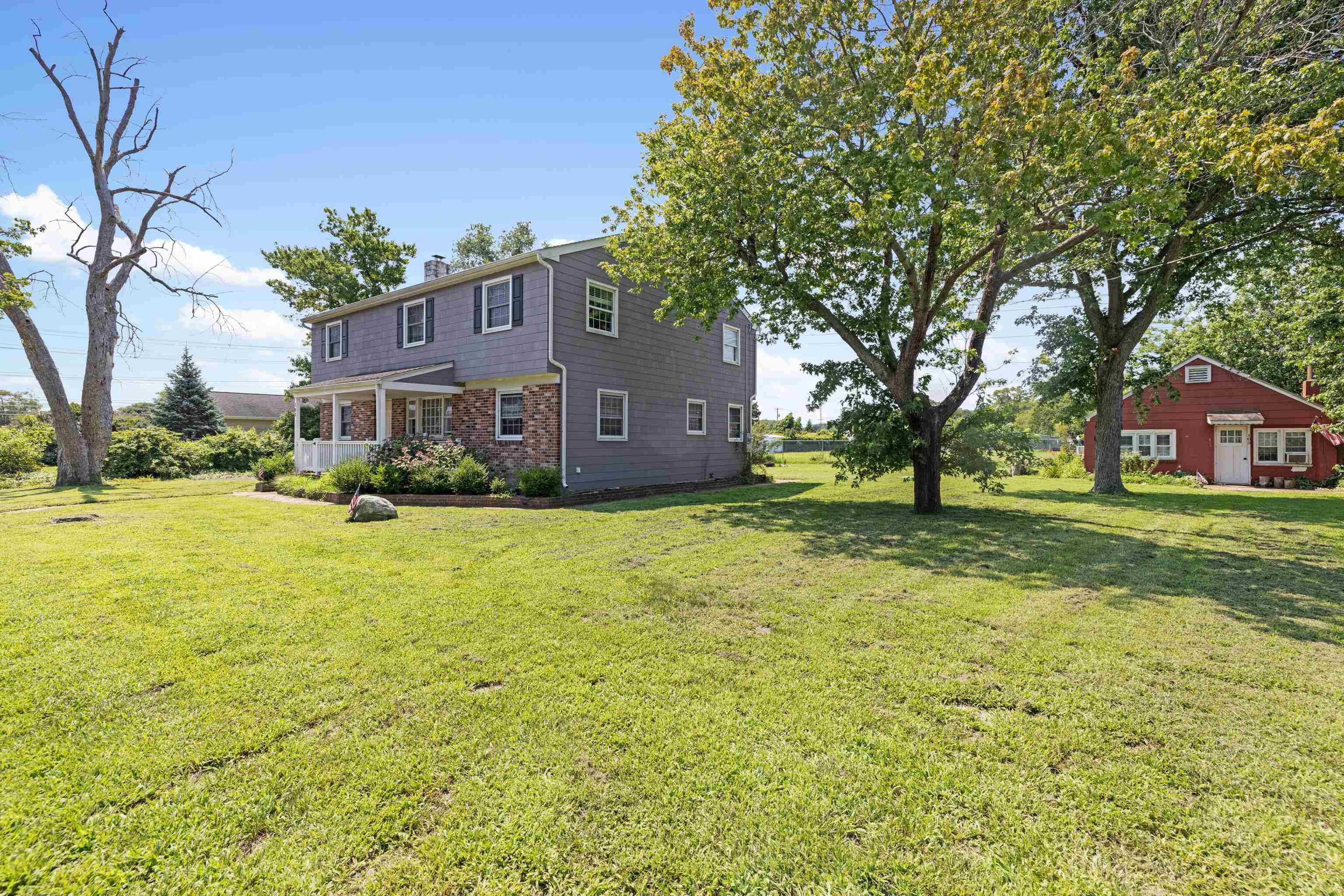 103 Bate Avenue Rio Grande, NJ 08242 - Photo 38 of 50 a front view of a house with a yard