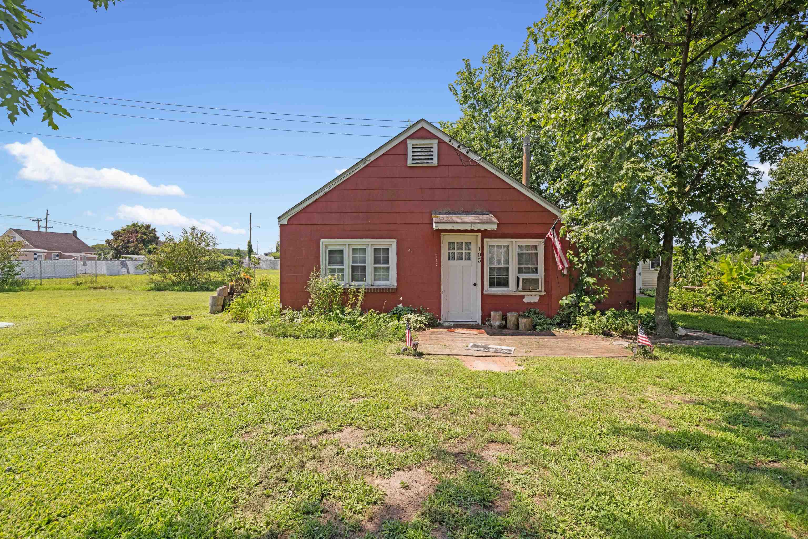 103 Bate Avenue Rio Grande, NJ 08242 - Photo 39 of 50 a view of a house with a yard