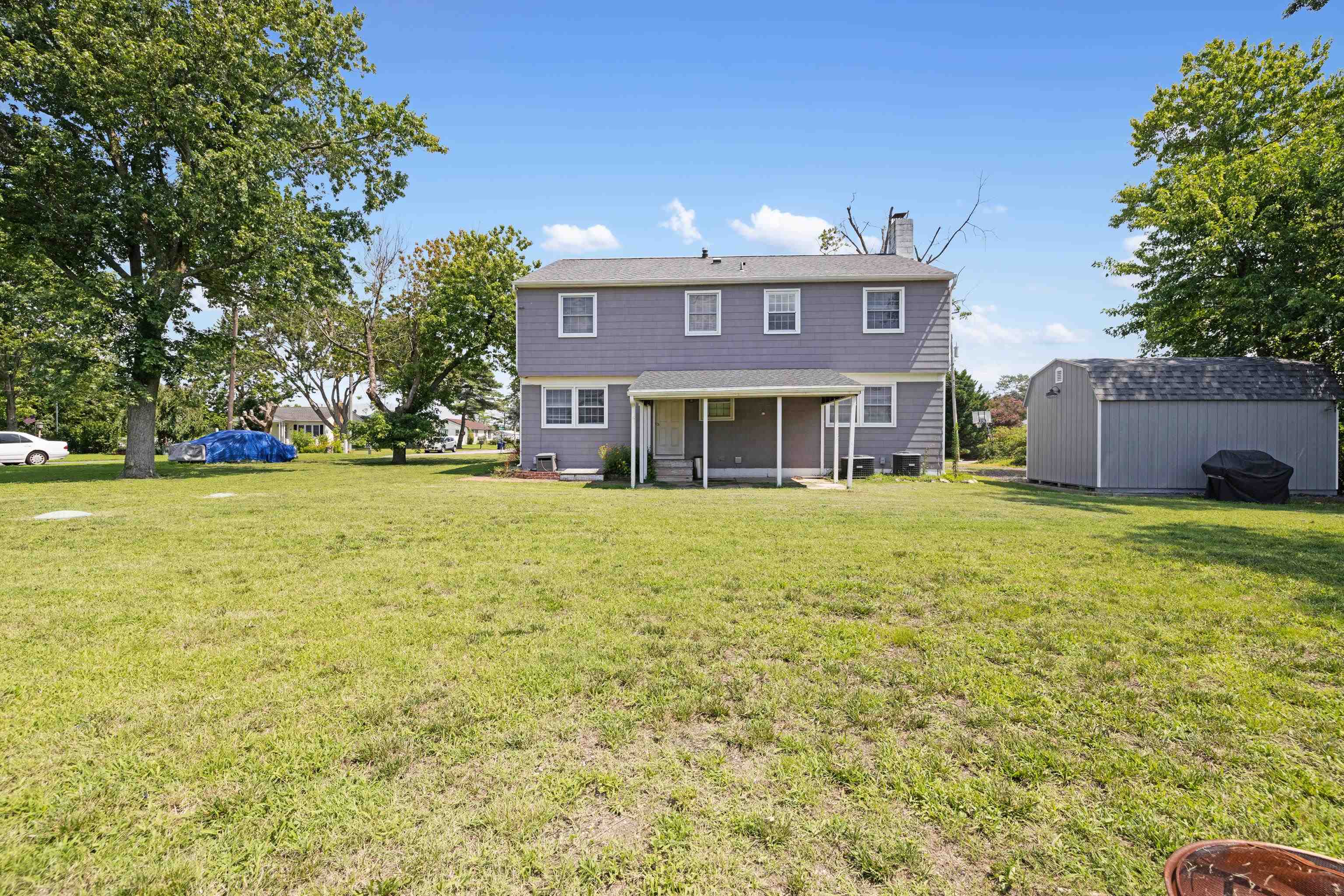 103 Bate Avenue Rio Grande, NJ 08242 - Photo 41 of 50 a front view of a house with a yard