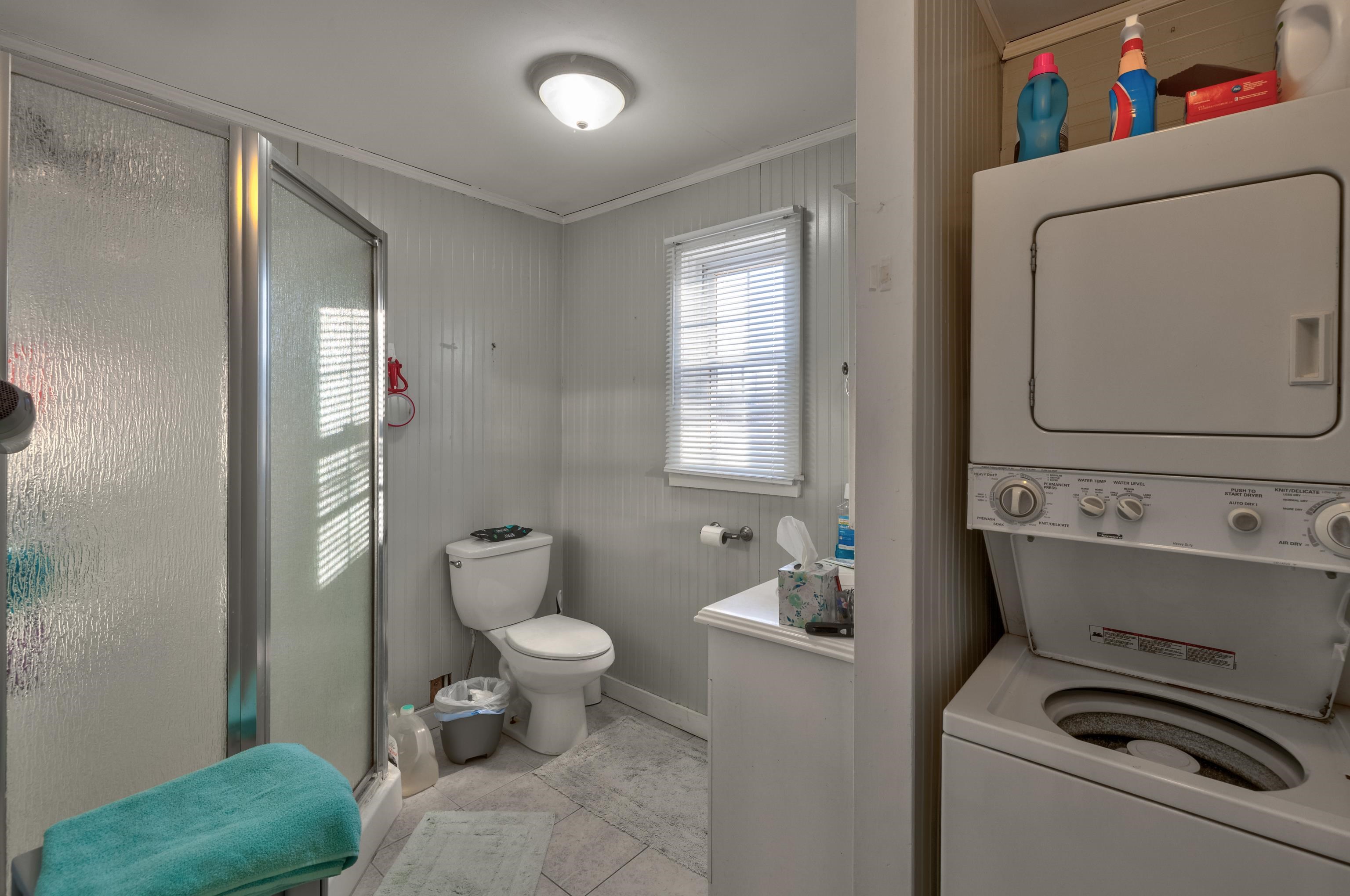 103 Bate Avenue Rio Grande, NJ 08242 - Photo 46 of 50 a bathroom with a toilet sink and mirror