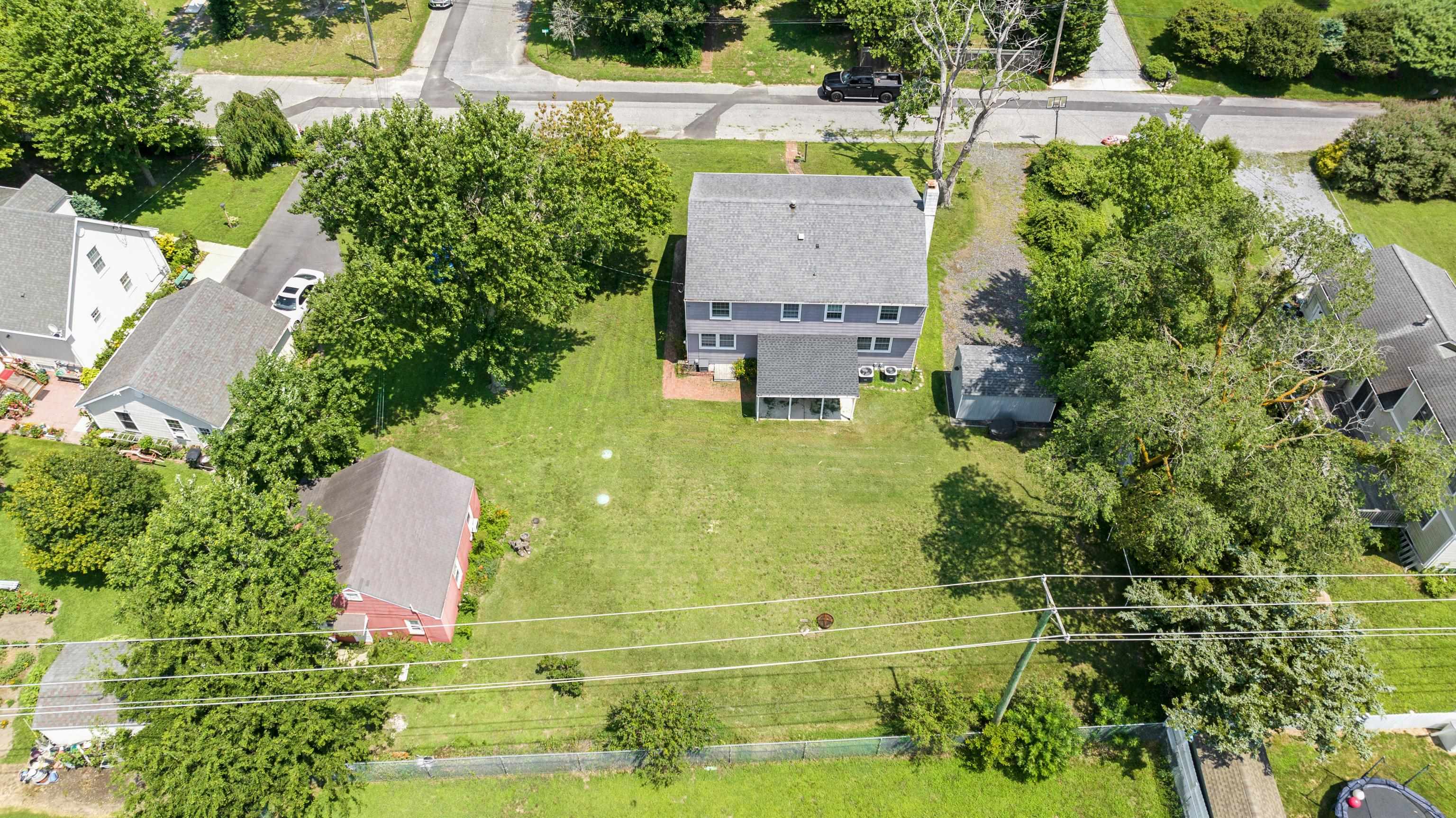103 Bate Avenue Rio Grande, NJ 08242 - Photo 6 of 50 an aerial view of residential house with pool and garden