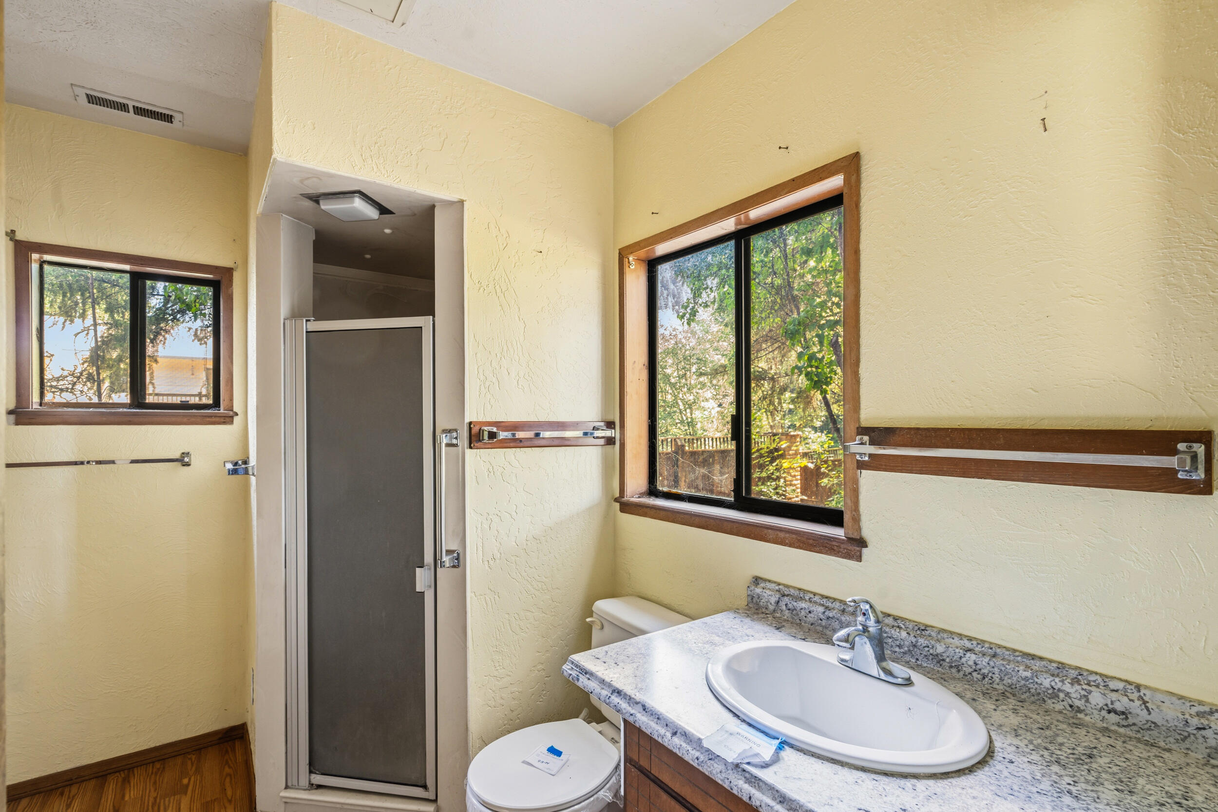 3300 West Evans Creek Road Rogue River, OR 97537 - Photo 10 of 21 a bathroom with a sink toilet and shower