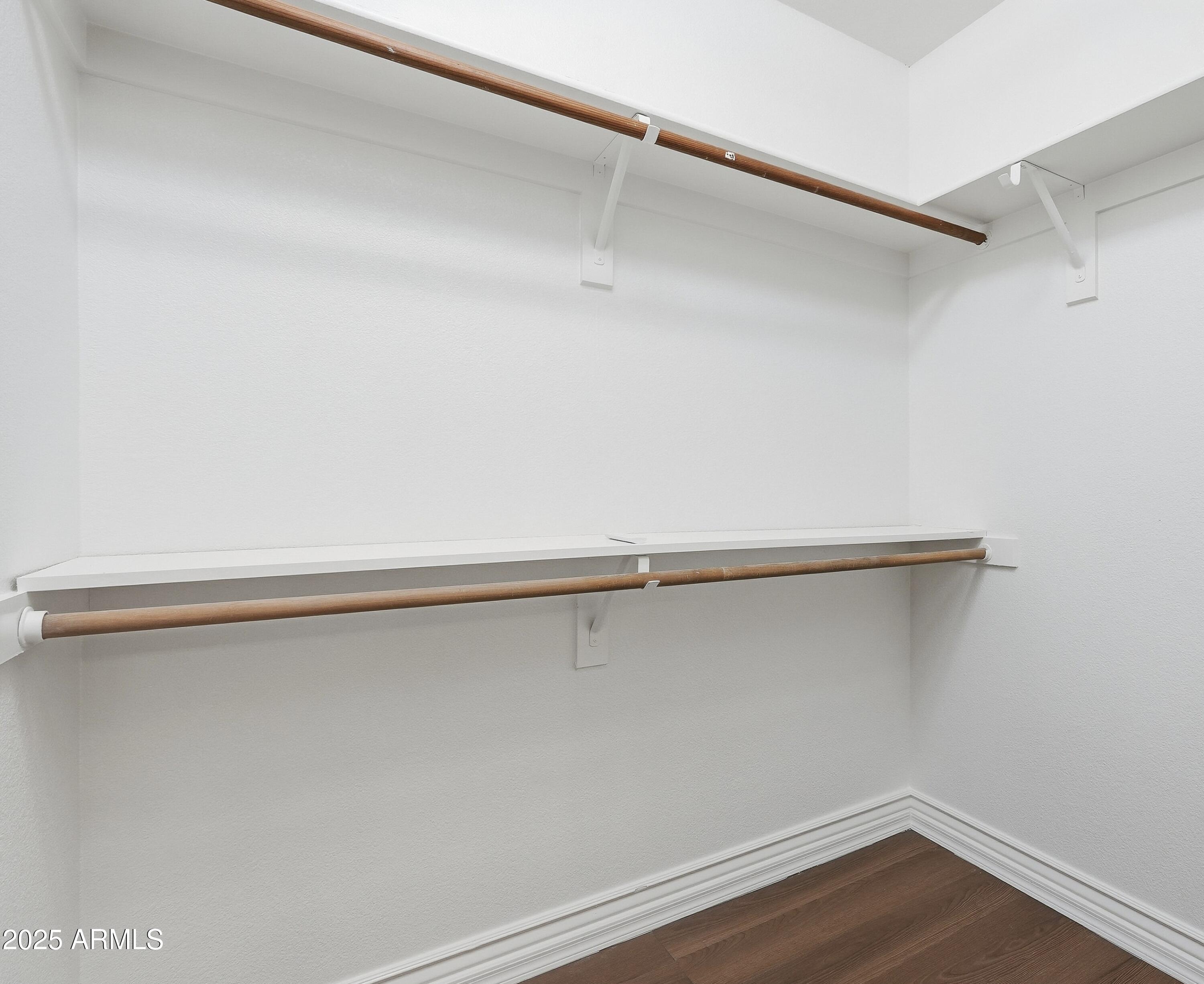 1825 West Ray Road, Unit 2145 Chandler, AZ 85224 - Photo 12 of 25 a view of a room with racks on the wall