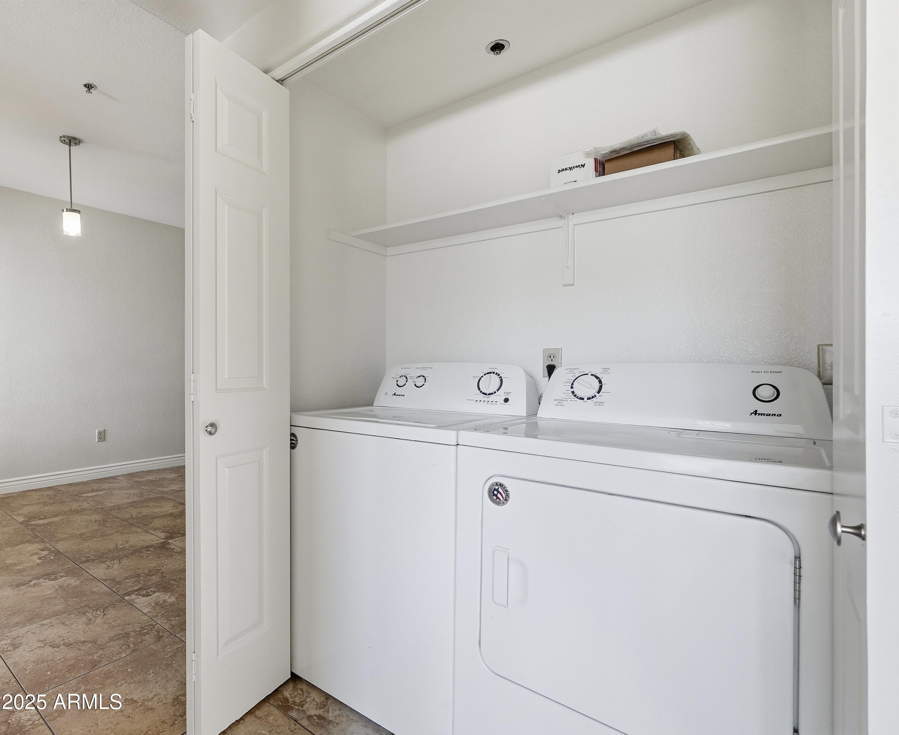 1825 West Ray Road, Unit 2145 Chandler, AZ 85224 - Photo 17 of 25 a utility room with dryer and washer