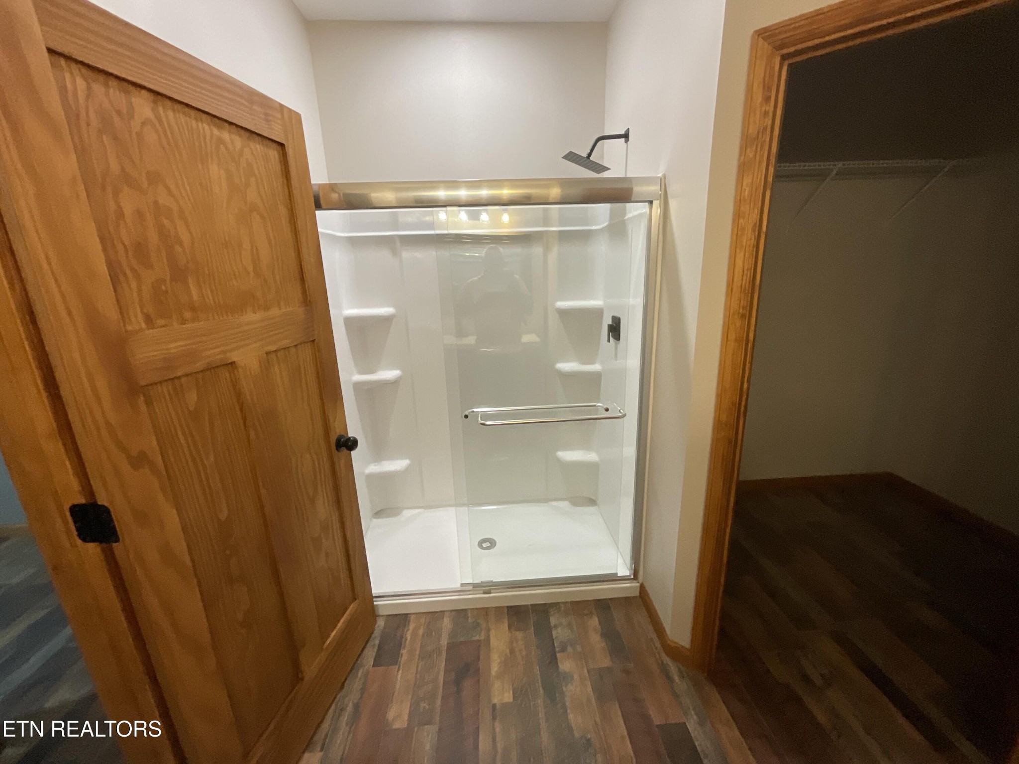 246 Burkemill Road Rockwood, TN 37854 - Photo 14 of 24 a bathroom with a glass door shower