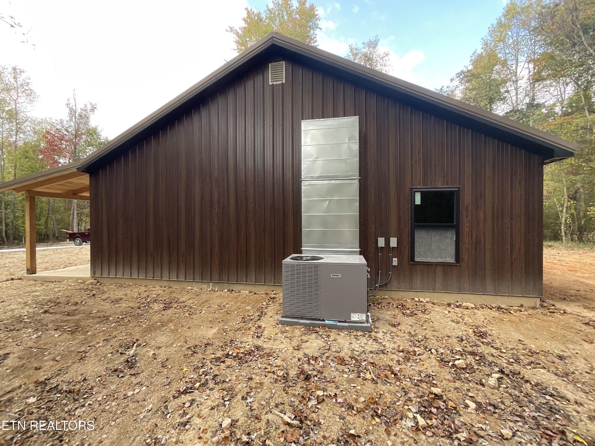 246 Burkemill Road Rockwood, TN 37854 - Photo 23 of 24 a backyard of a house