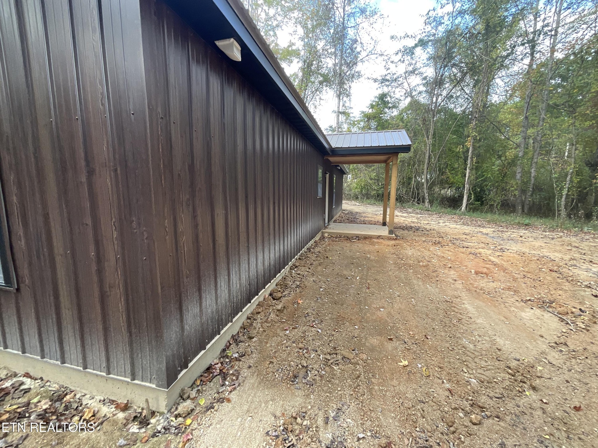 246 Burkemill Road Rockwood, TN 37854 - Photo 24 of 24 a view of backyard with green space and wooden fence