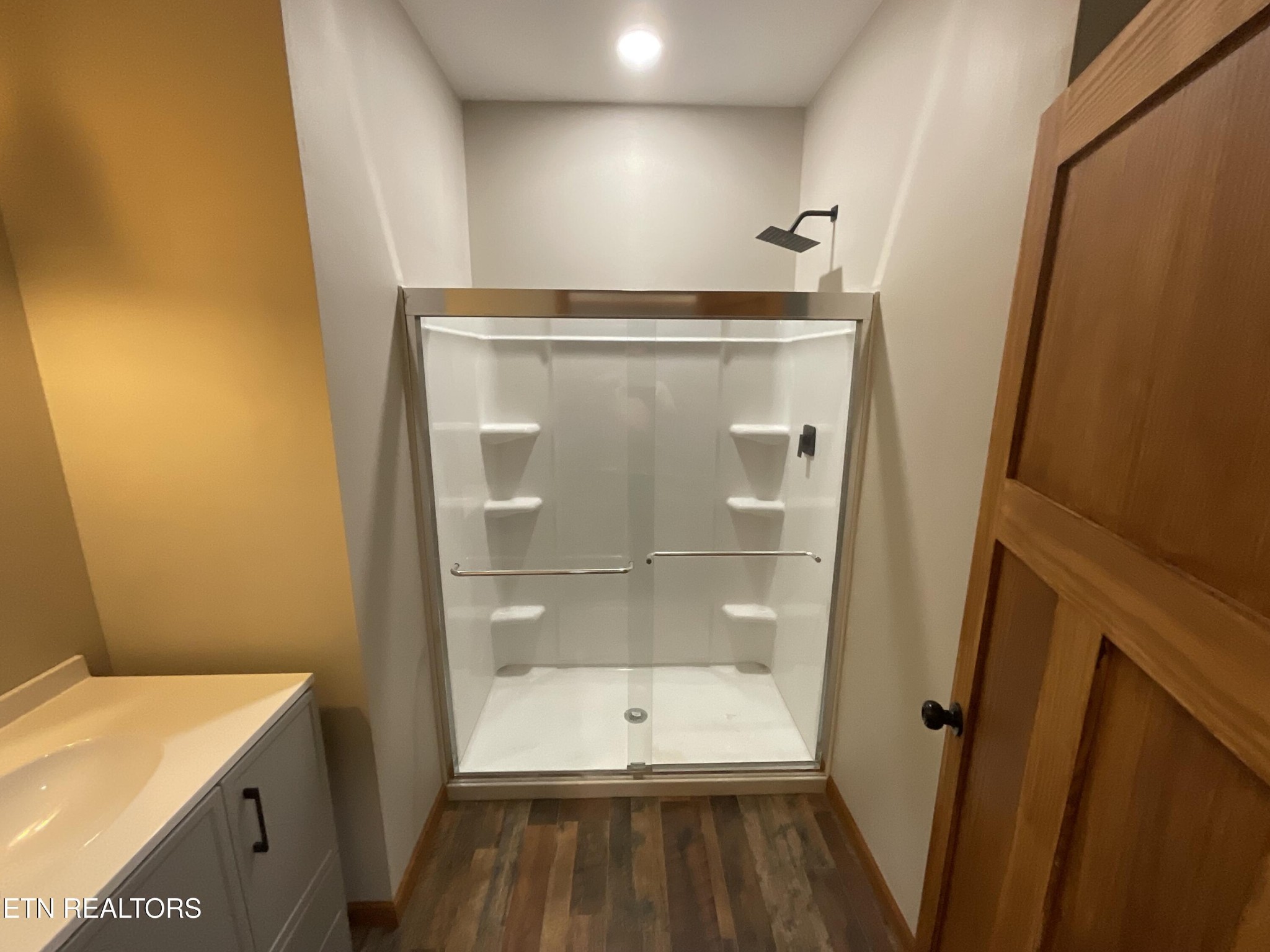 246 Burkemill Road Rockwood, TN 37854 - Photo 5 of 24 a walk in closet with wooden floor