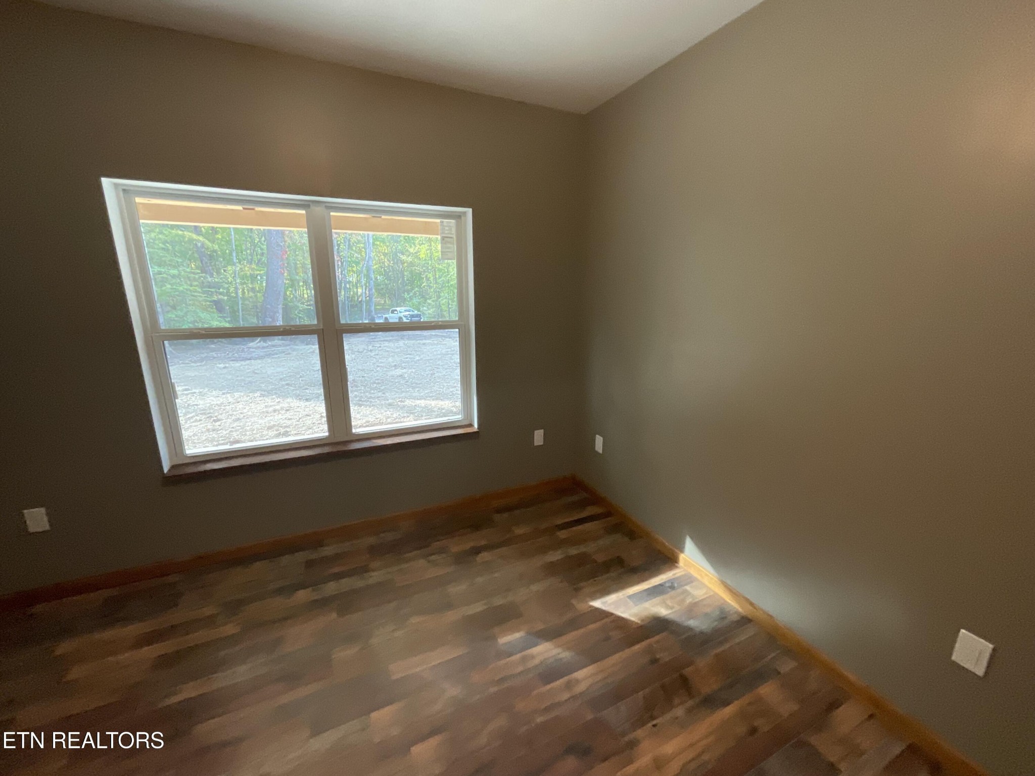 246 Burkemill Road Rockwood, TN 37854 - Photo 9 of 24 a view of an empty room with a window