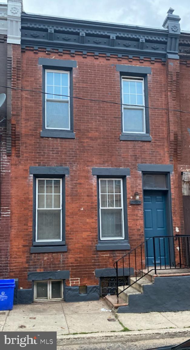 3963 Wyalusing Avenue Philadelphia, PA 19104 - Photo 1 of 14 Charming brick facade with blue door.