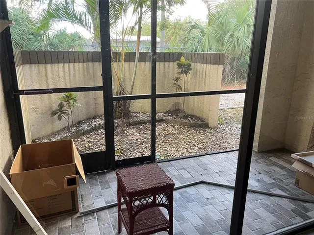 a view of a balcony with chair